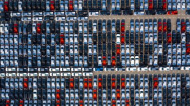 New car lined up in the port for business car import and export logistic, Aerial view. clipart