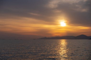 Atina Yunanistan Paleo Faliro plajda gün batımı sahnesi