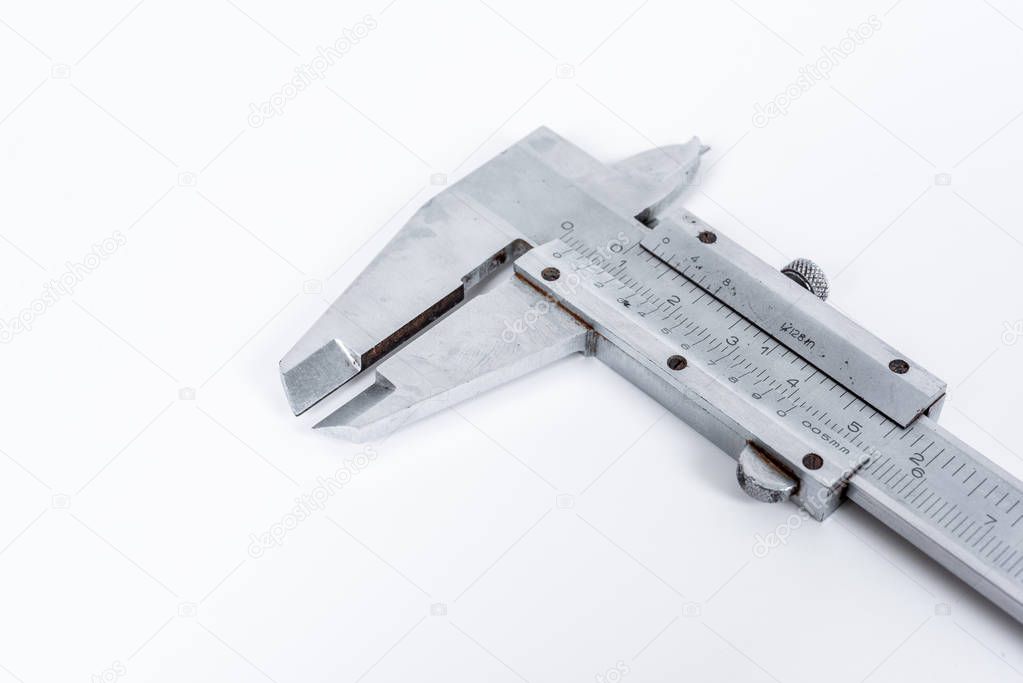 Vernier calipe or caliper. Precision measuring tools from silver steel.on a white background.