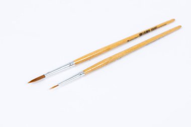 Yağlı Boya fırçaları. Çizim araçları, Boya fırçaları beyaz arka planda, uzay, üstten görünüm Kopyala