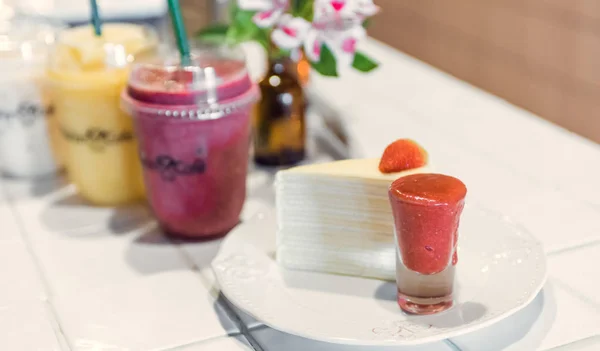 Strawberry Cheesecake : Delicious homemade cheesecake with strawberries on white table , selective focus