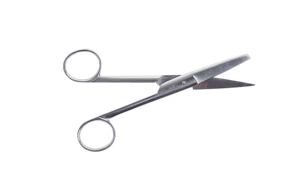 Um par de força cirúrgica de aço inoxidável sobre fundo branco — Fotografia de Stock