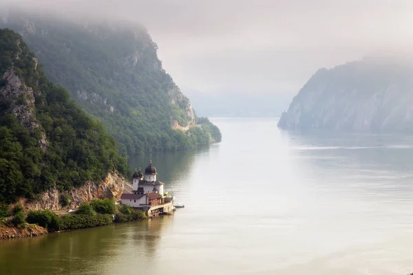 Summer landscape of Danube Gorge, at the border between Romania and Serbia. Mraconia orthodox monastery