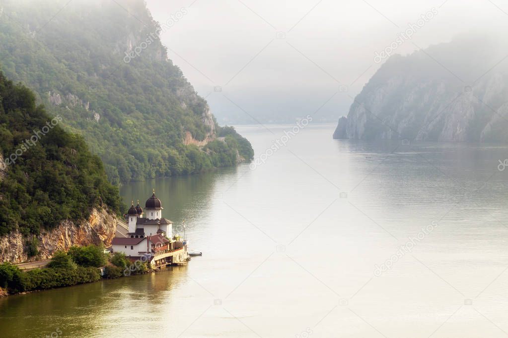 Summer landscape of Danube Gorge, at the border between Romania and Serbia. Mraconia orthodox monastery
