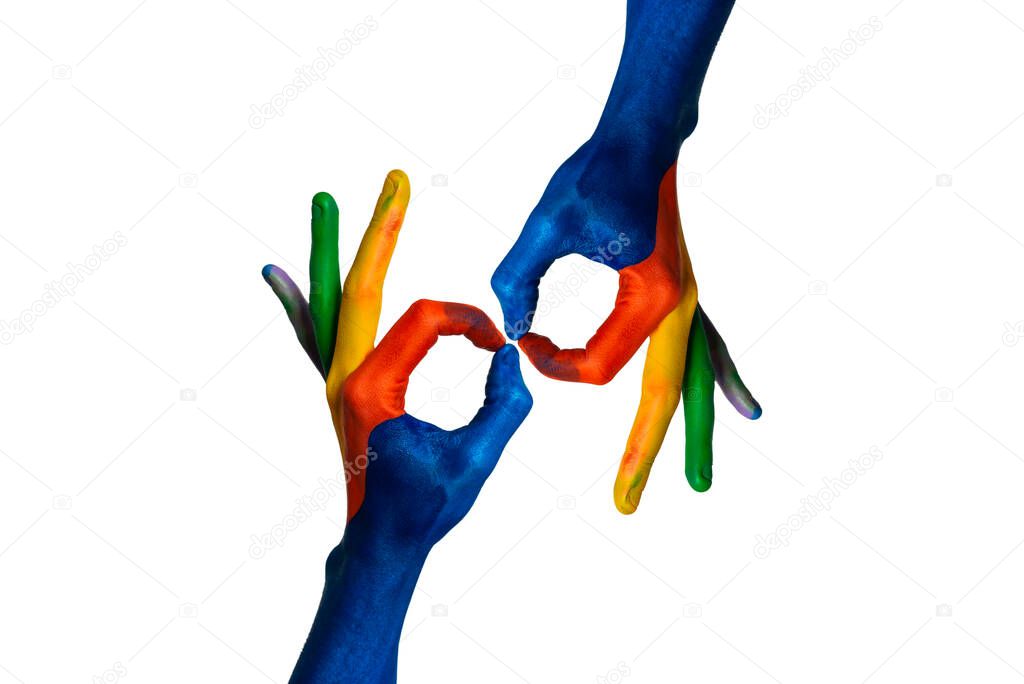 Stock photo of water painted hands making gestures on a white background.