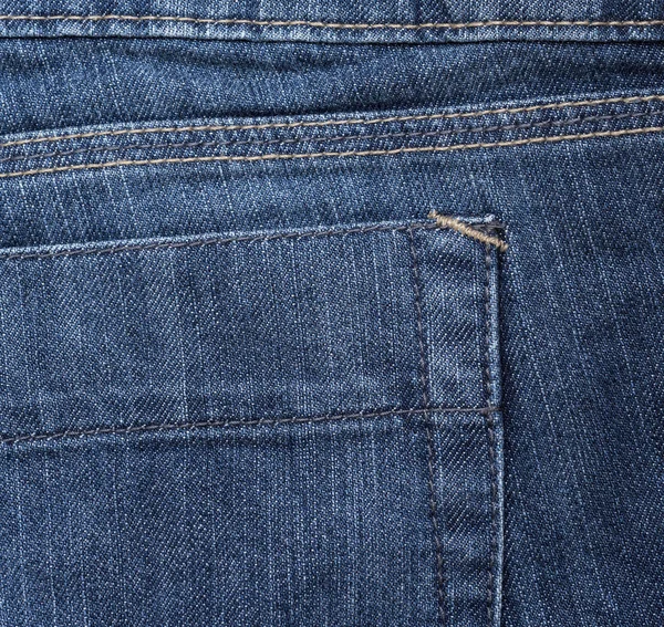 蓝色纺织品牛仔裤背面的片段 — 图库照片