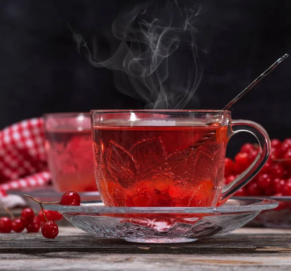 Fresh Hot Tea Viburnum Berries Transparent Glass Cup Gray Wooden — Stock Photo, Image