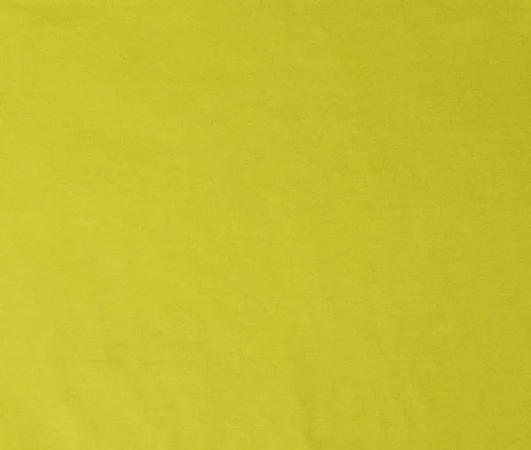 Желтая смятая мягкая ткань — стоковое фото