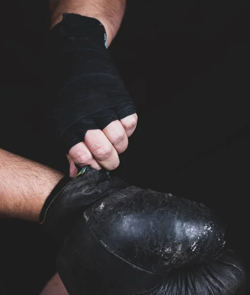 Athlete Puts Black Leather Boxing Gloves Fight Selective Focus — Stock Photo, Image
