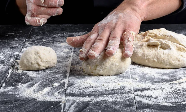 Cook Making Dough Balls Black Wooden Table Close — Stock Photo, Image