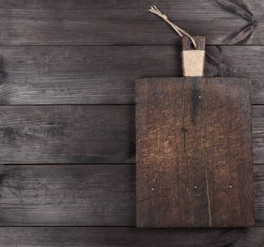çok eski kahverengi kare kesme tahtası ahşap tahta arka plan, boş alanı üzerinde bir saplı