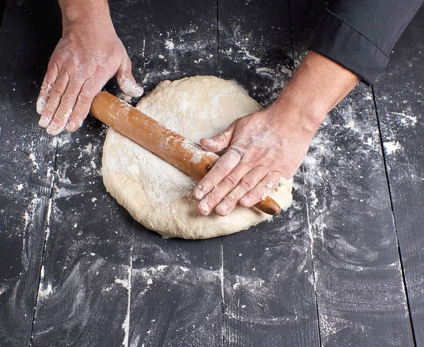 Chef Black Tunic Rolls Dough Pizza Top View — Stock Photo, Image