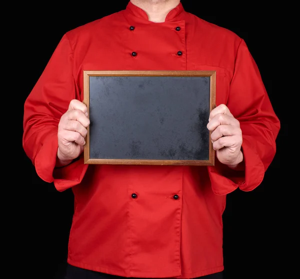 Chef Uniforme Vermelho Segurando Uma Moldura Madeira Vazia Com Fundo — Fotografia de Stock
