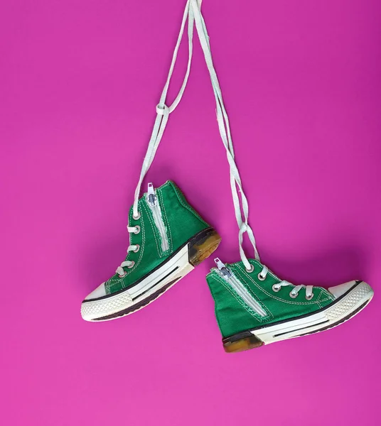 Pair Green Textile Sneakers Hanging Bella Lace Pink Background — Stock Photo, Image
