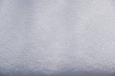 Beyaz kar doku seçici odak bir kış gününde