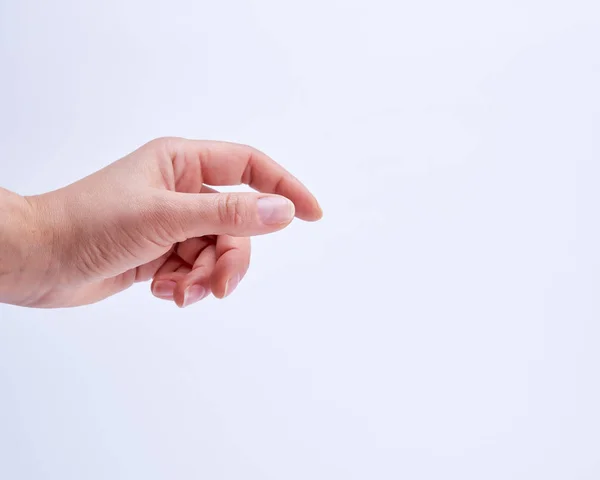 Mão Feminina Mostrando Gesto Segurar Objeto Fundo Branco — Fotografia de Stock