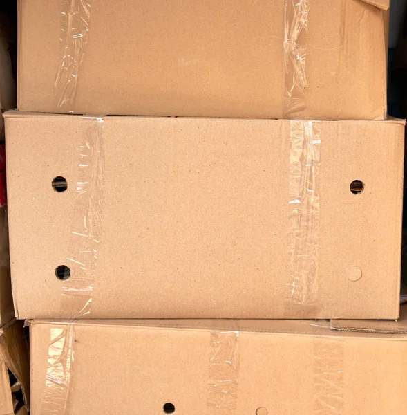 Pilha de caixas de papelão marrom — Fotografia de Stock
