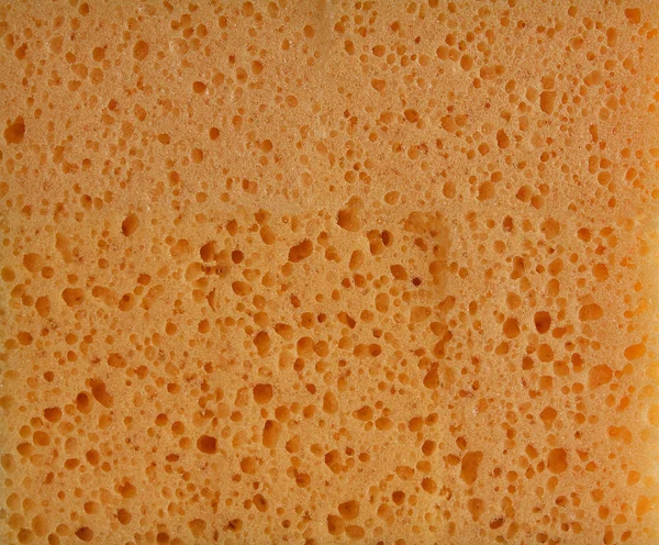 texture of yellow kitchen sponges for washing dishes