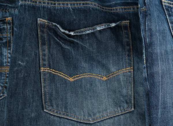 Back pocket on blue jeans, full frame — Stock Photo, Image