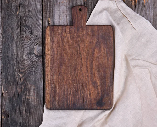 Пустая старая коричневая деревянная доска с ручкой — стоковое фото