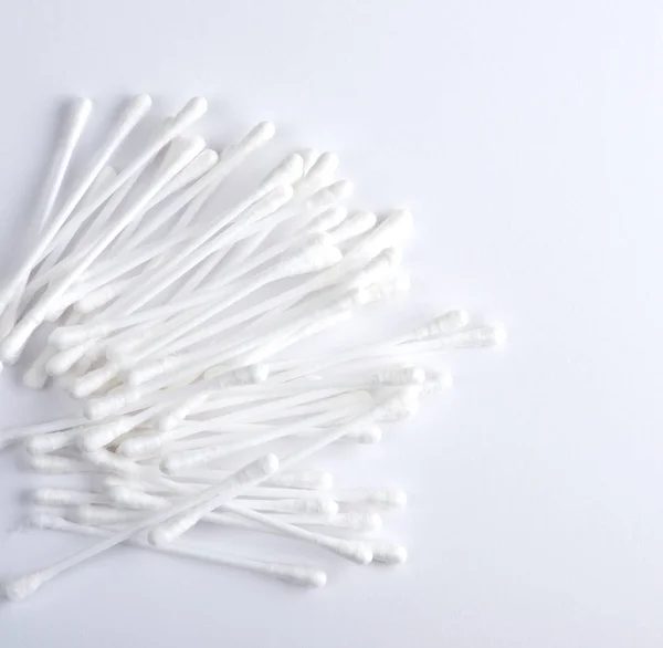 Plastic sticks with white cotton for ear cleaning — Stock Photo, Image