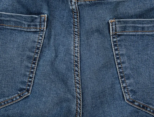 Back pocket on blue jeans, full frame — Stock Photo, Image