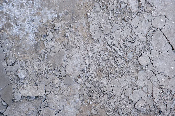 Fragmento de piso de cemento agrietado gris — Foto de Stock