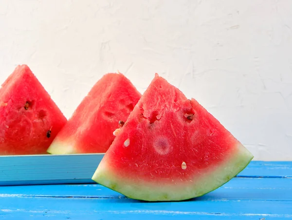 sliced triangles ripe red round watermelon with seeds