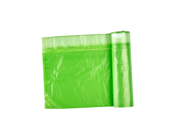 Крученый зеленый пластиковый пакет для мусорки — стоковое фото