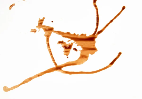 Spilled black coffee on white paper, abstract stains — Stock Photo, Image