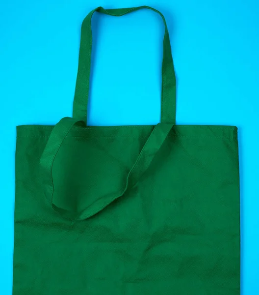 Empty green ecological bag made of viscose with long handles — Stock Photo, Image