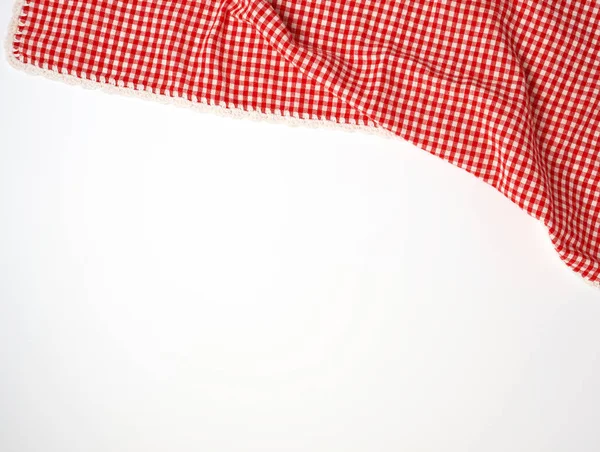 Wit rood geruite keuken handdoek op een witte achtergrond — Stockfoto