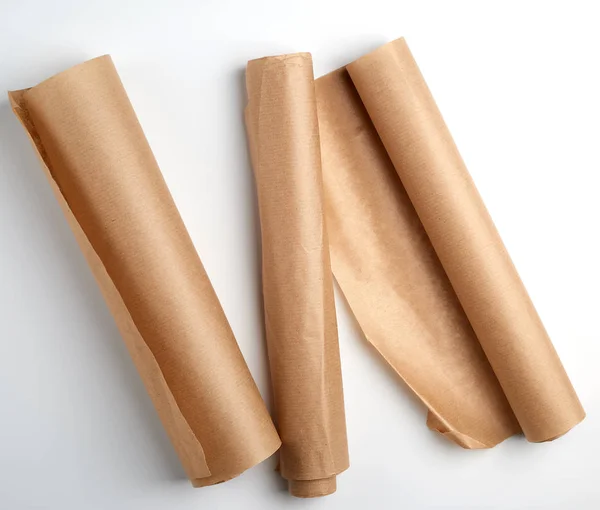 Three rolled rolls of parchment baking paper — Stock Photo, Image