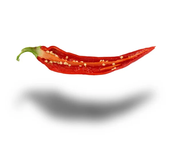 半红辣椒与种子隔离在白色背景 — 图库照片