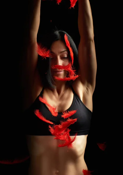 Joven hermosa atlética chica en negro ropa vomita rojo fea —  Fotos de Stock