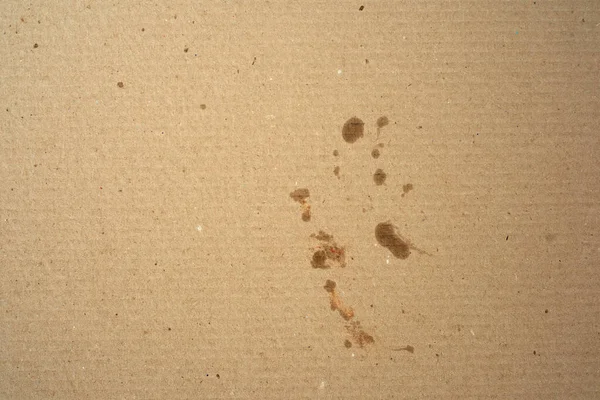 Yağlı lekeli bir kutunun kahverengi kağıt parçası.,