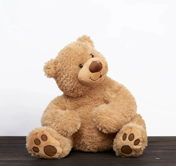 Brown Teddy Bear Sits Brown Wooden Table White Background — Stock Photo, Image
