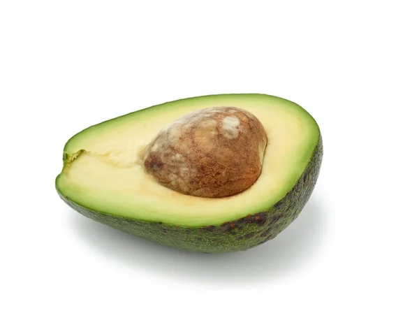 Een Halve Avocado Groen Met Bruine Zaden Binnen Geïsoleerd Een — Stockfoto