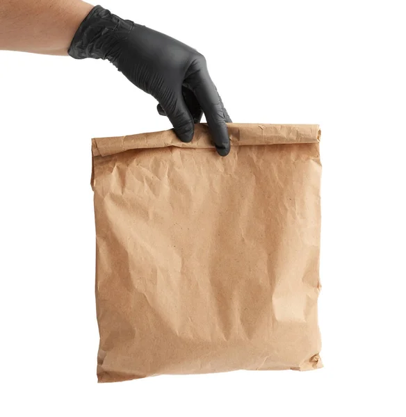 Рука Черной Латексной Перчатке Держит Полный Бумажный Пакет Коричневой Бумаги — стоковое фото