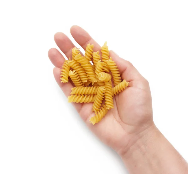 Hand Holds Raw Fusilli Pasta Part Body Isolated White Background — Stock Photo, Image