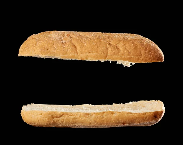 Halved Baked Ciabatta Loaf Isolated Black Background Sandwich Blank Flying — Stock Photo, Image