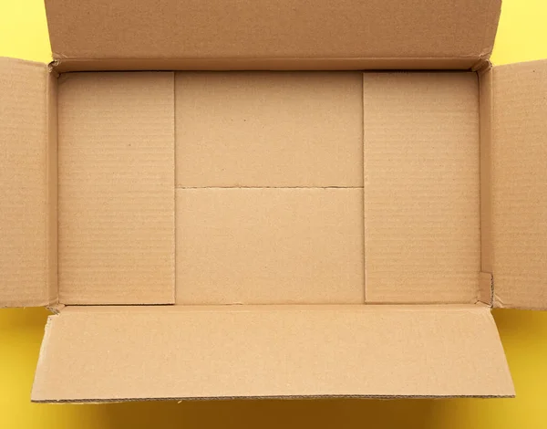 empty open cardboard brown box, bottom, top view