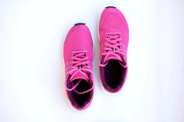 Concept Run Sapatos Corrida Rosa Para Mulheres Fundo Branco Vista — Fotografia de Stock