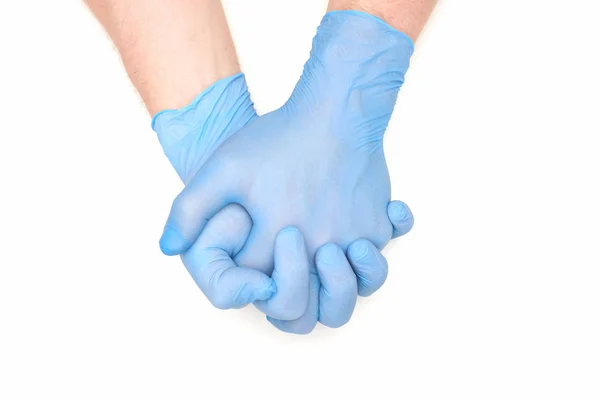 Mani in lattice blu guanti chirurgici con dita interbloccate su — Foto Stock
