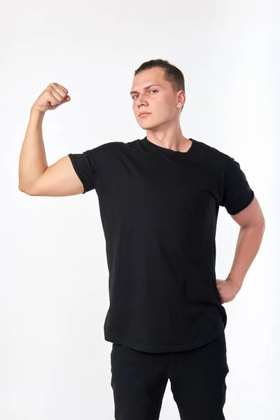 I'm strong. Portrait of handsome young confident brunet wearing — Stock Photo, Image