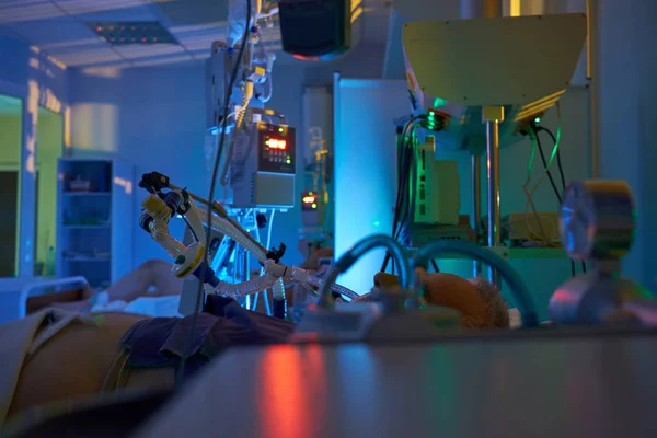 Glowing monitors in intensive care department. Nigth shift at ic — Stock Photo, Image
