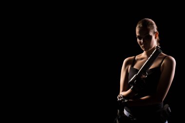 Siyah arka plan üzerine izole silah tabanca. Sporcu bir silahla. Çekim spor tabanca.