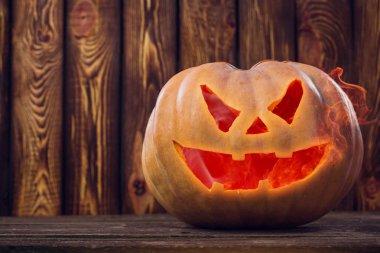 Cadılar Bayramı Balkabağı tasarım ahşap arka plan üzerinde kopya alanı ile