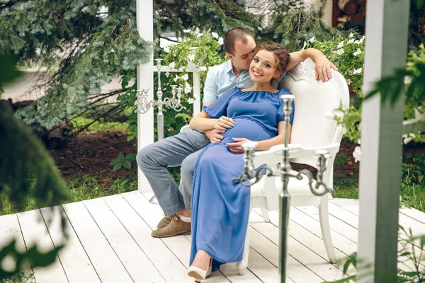 Pregnant Woman Her Husband Sitting Sofa Hugging Cozy Cafe Terrace — Stock Photo, Image