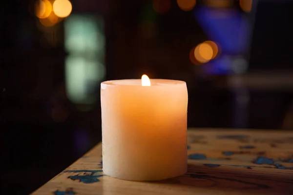 Candle flame close up on a black background — Stock Photo, Image